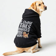 Labrador wearing an 'I Chase Tails, Mostly My Own' hoodie
