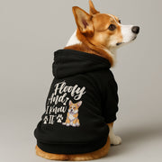 Corgi wearing a 'Floofy and I Know It' hoodie